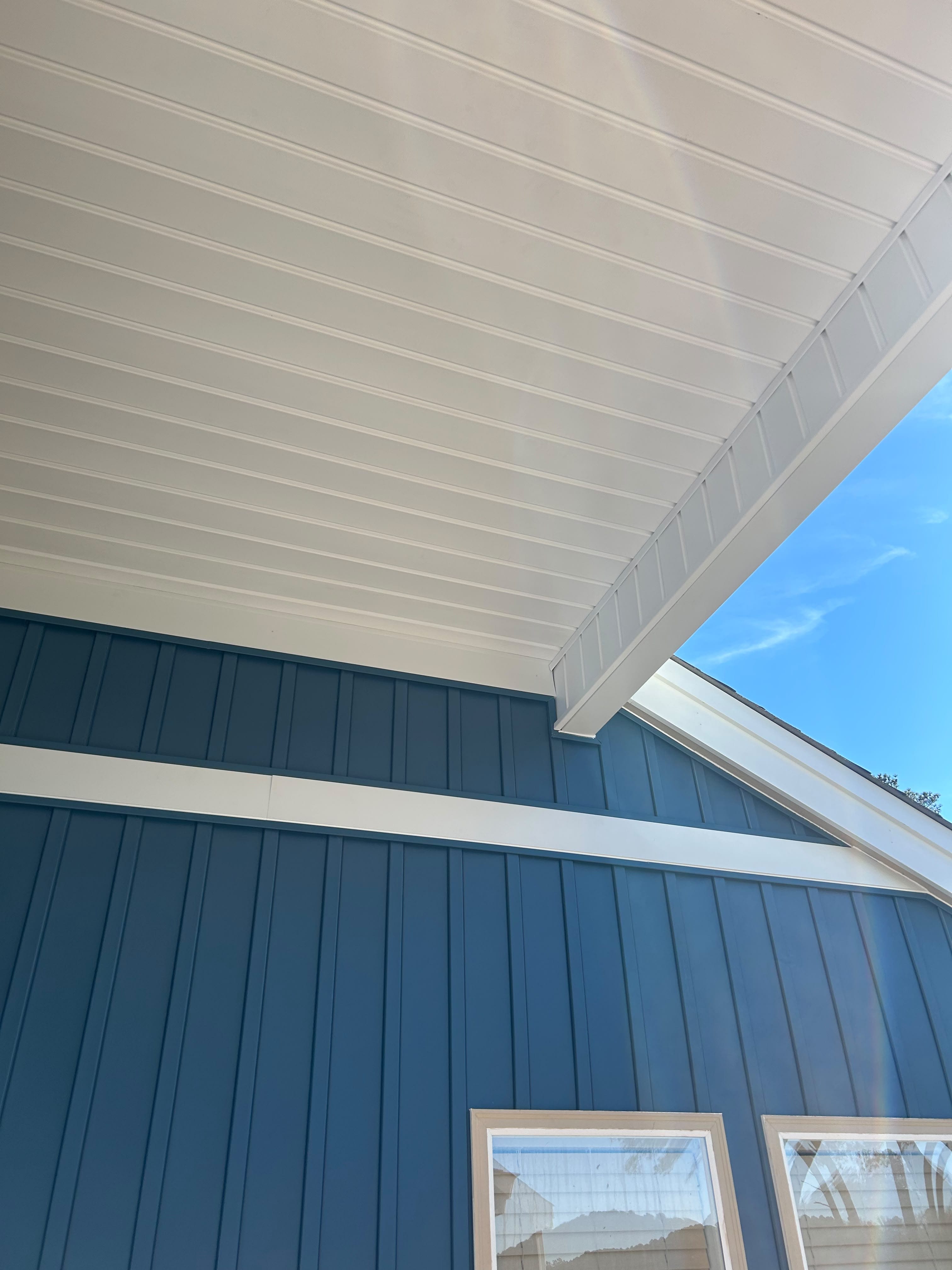 Finished soffit and fascia along a home roofline.